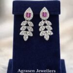 Hallmark 925 silver leaf pattern and ruby drop earrings