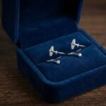 Delicate silver airplane open toe ring with cubic zirconia