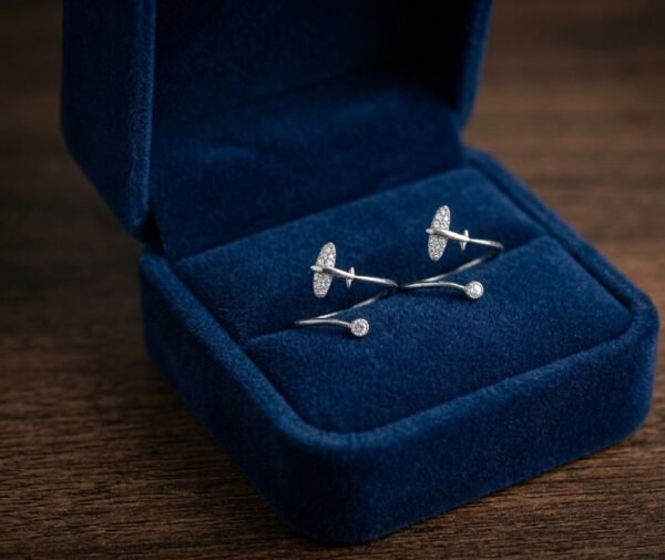 Delicate silver airplane open toe ring with cubic zirconia